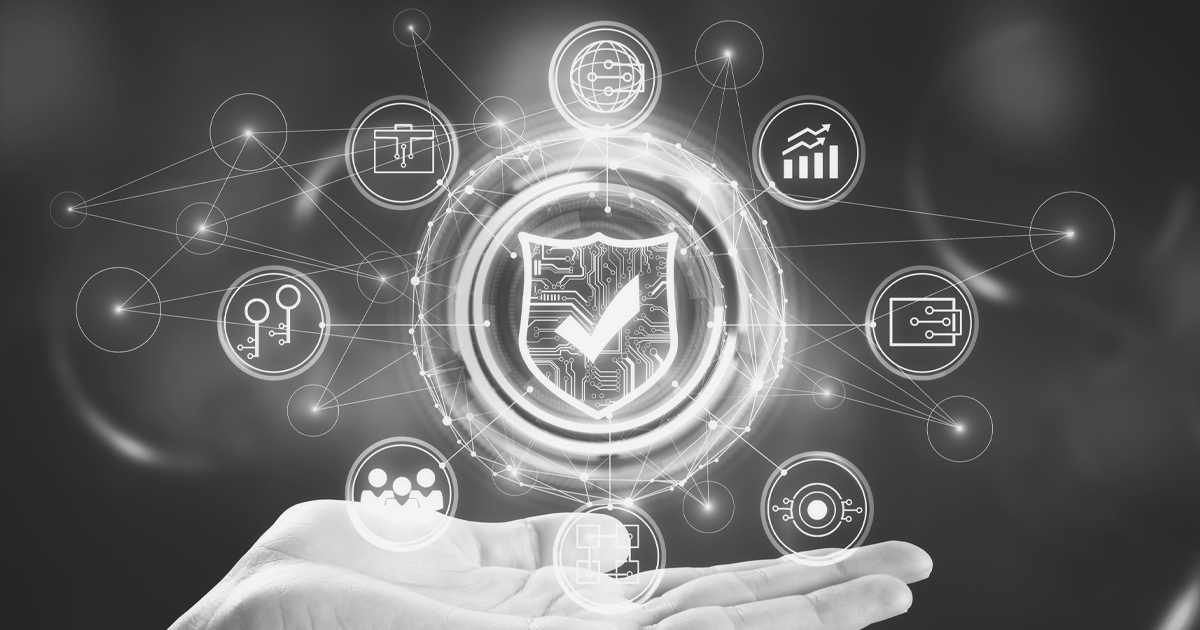 Image of a hand with a shiled icon floating in its palm surounded by other Digital iconography