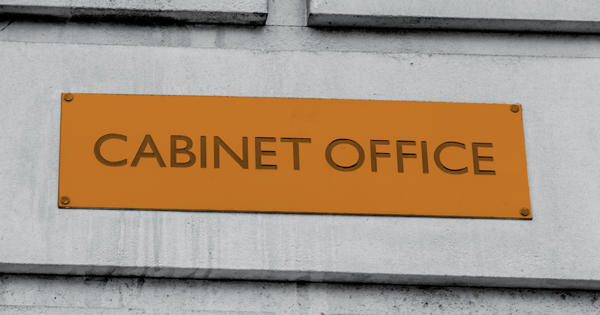Image of a sign on a wall reading Cabinet Office