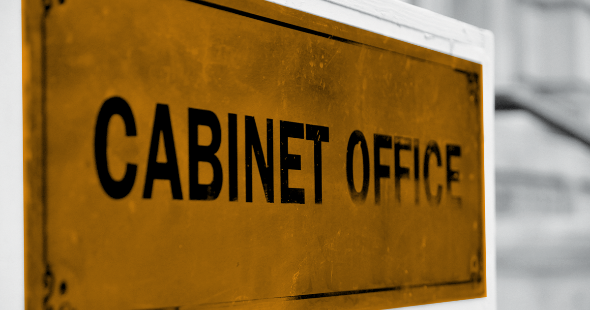 Image of orange highlighted sign reading cabinet office