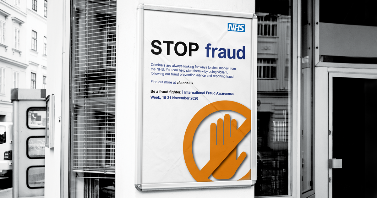 An NHSCFA 'Stop Fraud' poster displayed on a wall on the entrance of a building.