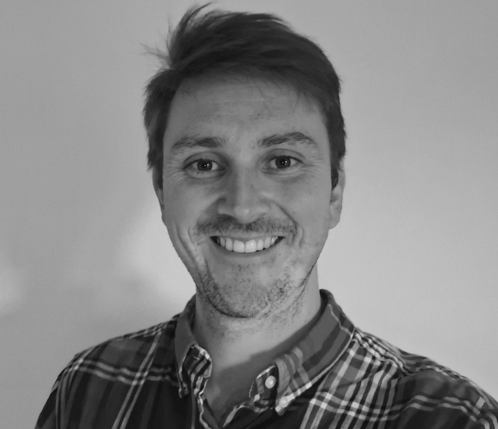 Black and white image of Ben Alcock