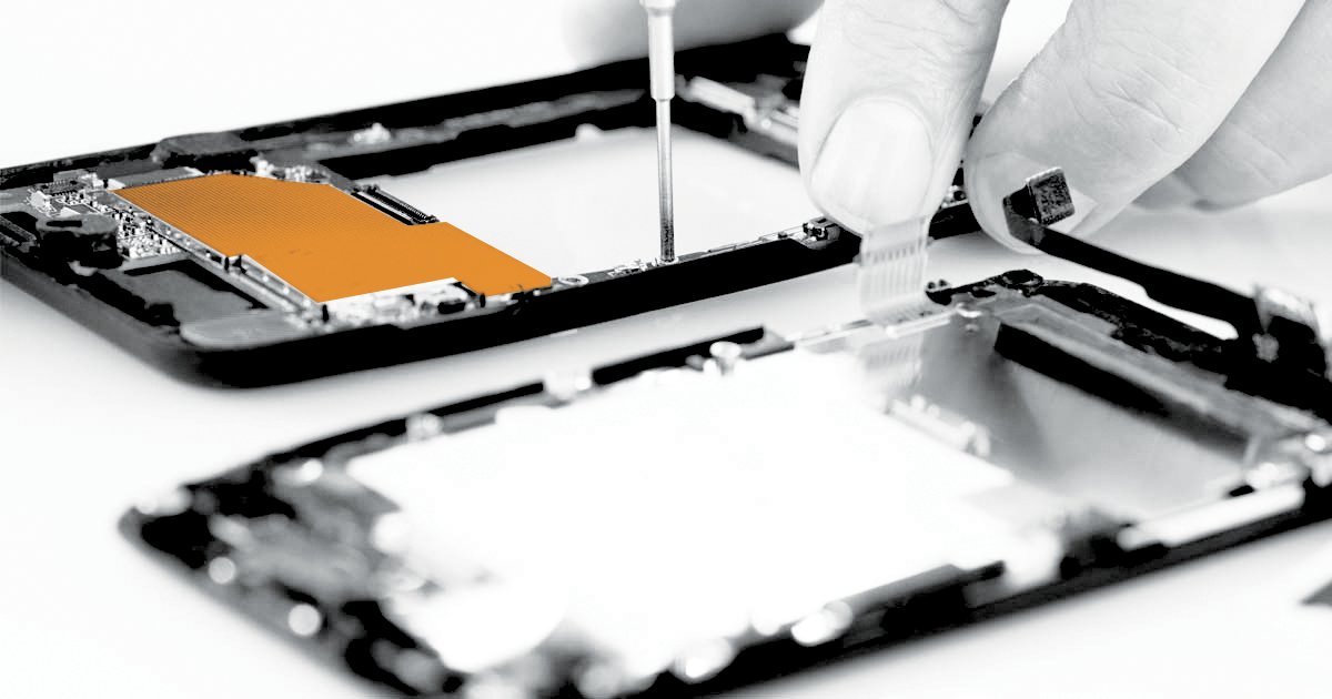 Image of a person deconstructing a smart phone.