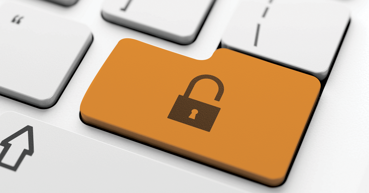 Image showing a button on a computer keyword with an unlocked padlock on it.